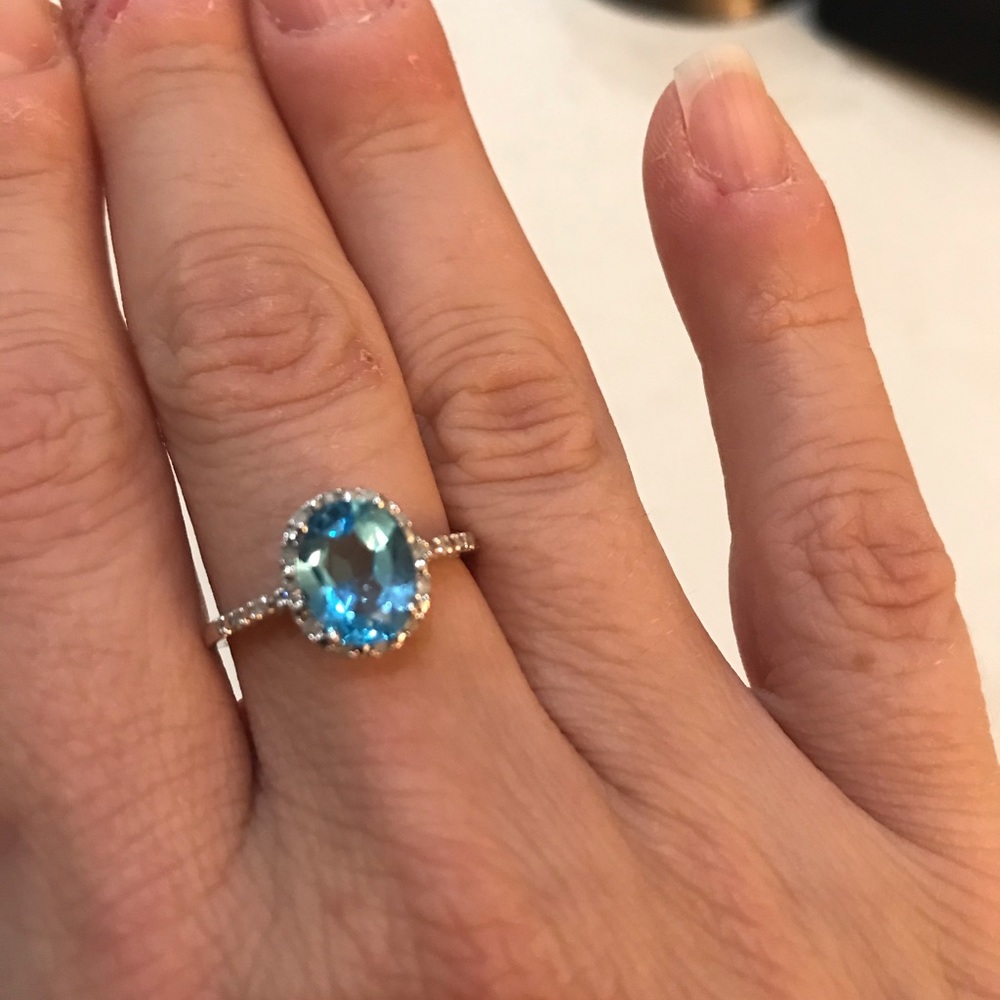 Blue topaz and diamond ring